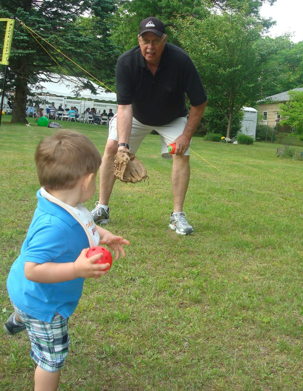 Tom Emig's father playing catch with his son